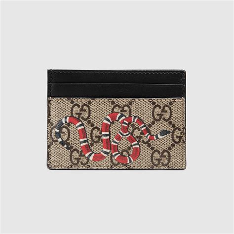 tarjetero gucci serpiente|Tarjetero Gucci GG Supreme (para 8 tarjetas) con estampado de .